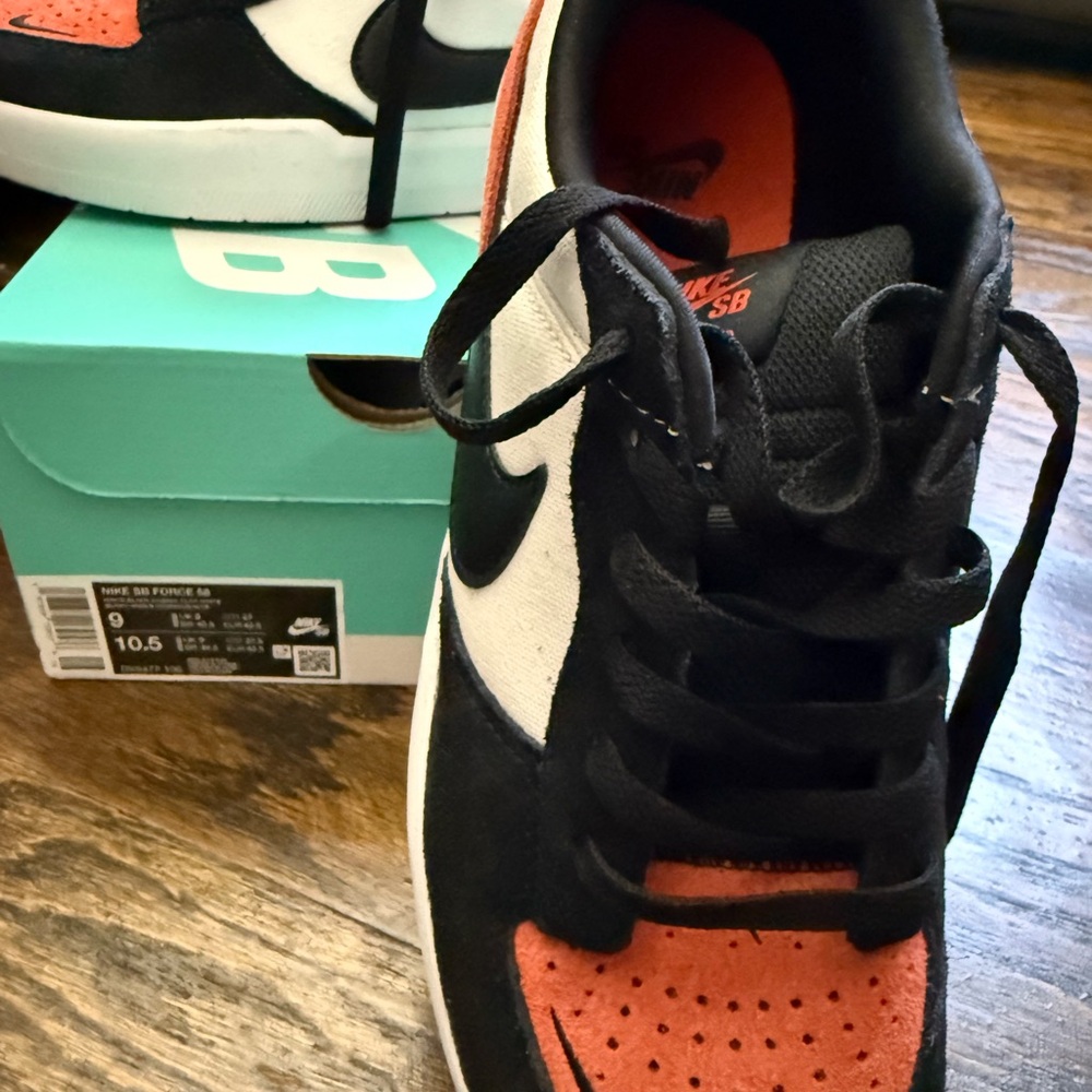 Nike SB Dunk Low Black, White, and Orange Sneakers